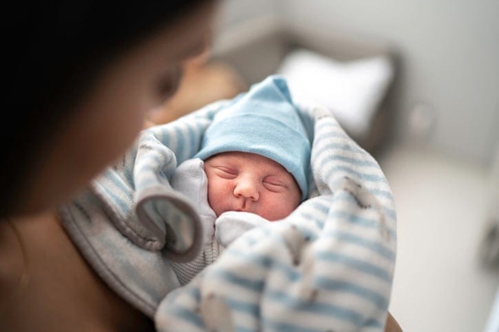 newborn with mother
