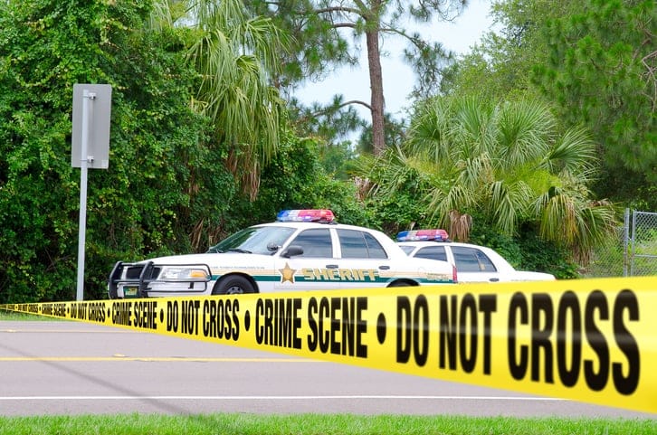Police cordon tape at a crime scene.