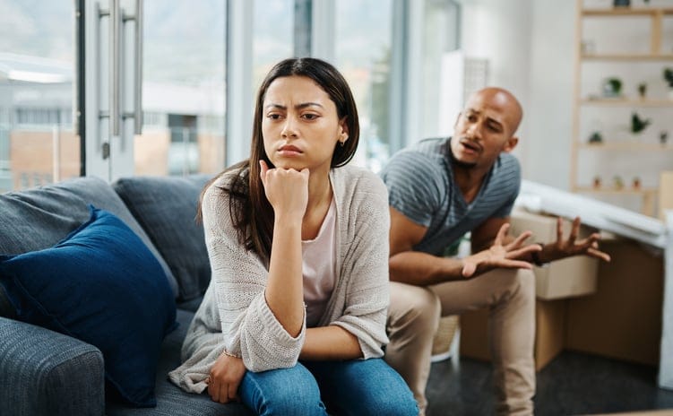 unhappy black couple fighting