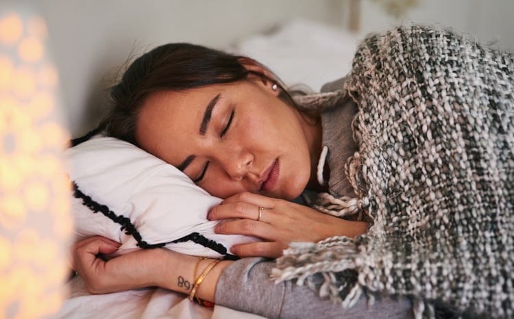 woman asleep in the bed