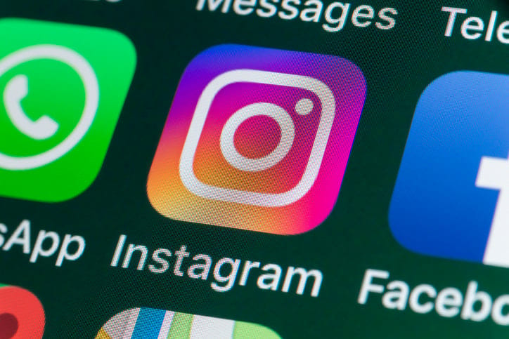 Instagram, WhatsApp, Facebook and other Apps on iPhone screen.