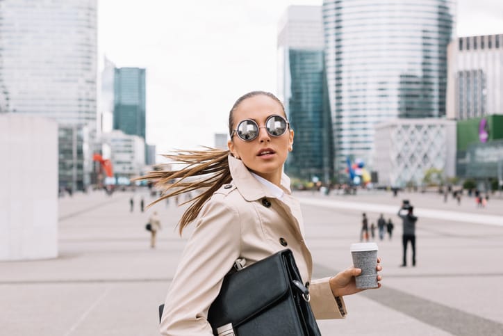 Young woman in a hurry going to work.