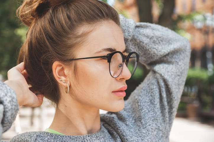 woman wearing reading glasses