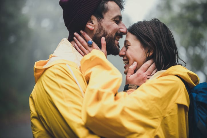 Happy couple in the forest.