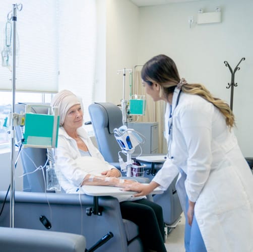 A woman having cancer treatment.