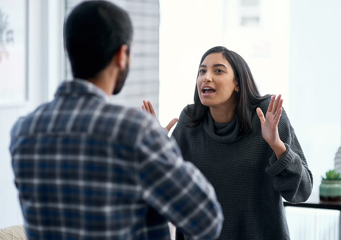 woman shouting at man