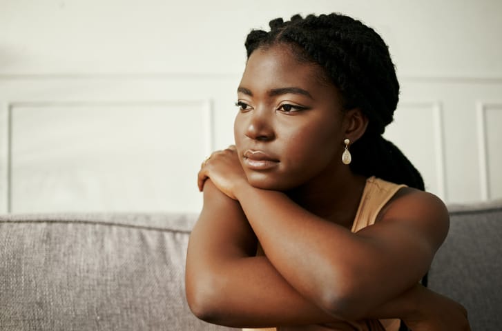 sad woman looking forlorn