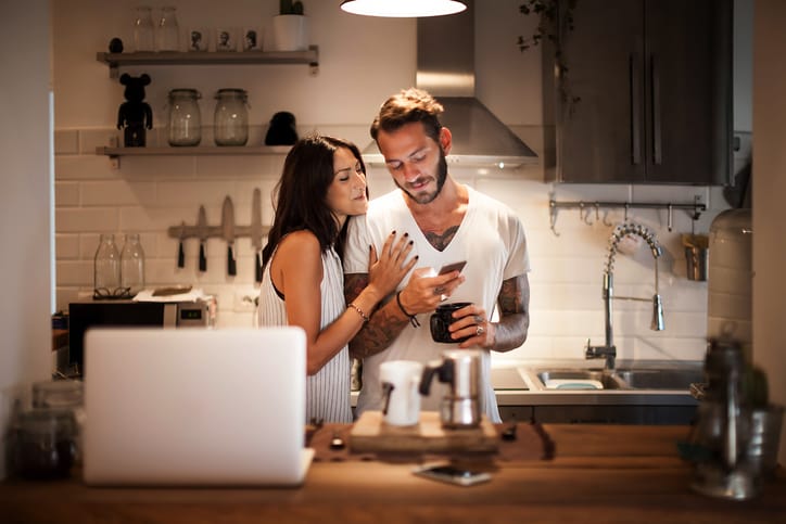 couple chatting in kitchen
