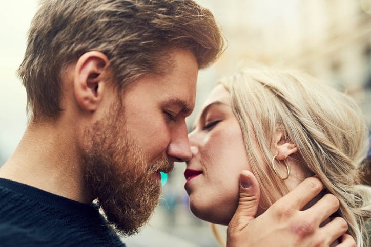 young attractive couple kissing