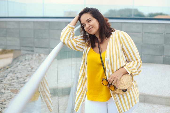 upset woman in yellow top