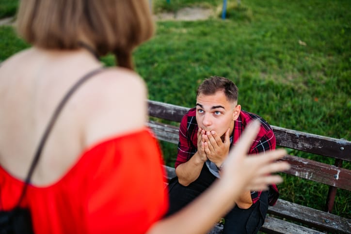 couple arguing in park