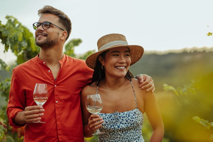 happy couple embracing at winery