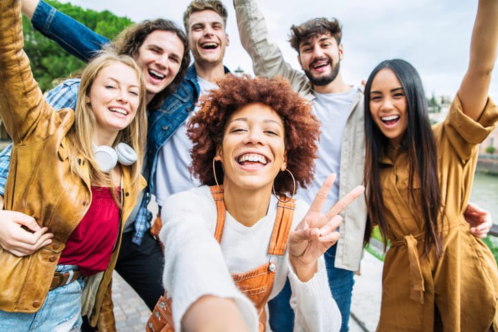 group of friends posing outdoors