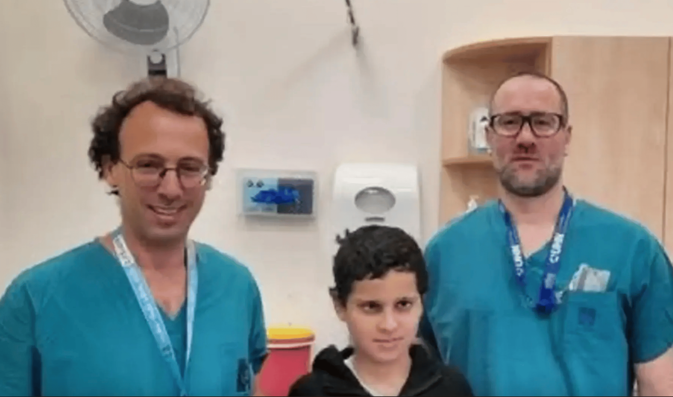 Suleiman Hassan with surgeons