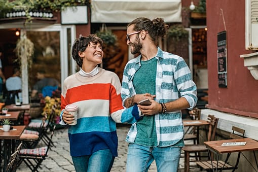 happy smiling couple going on walk