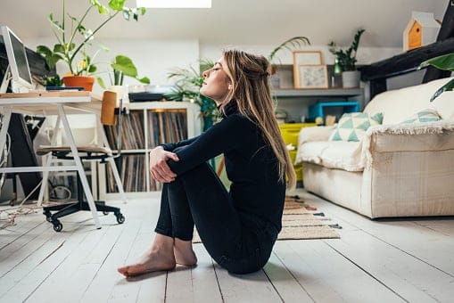 woman doing yoga in the floor