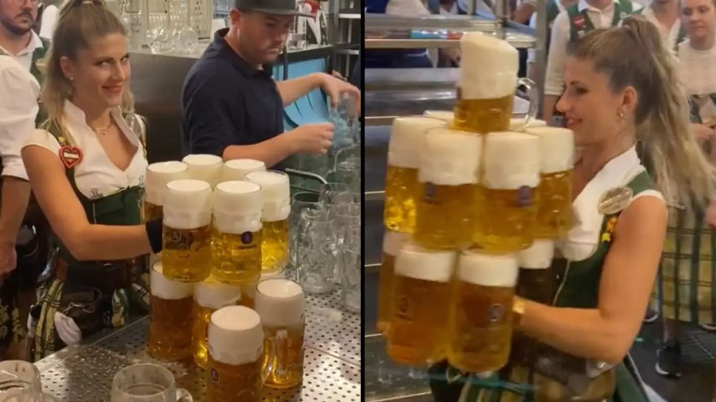 oktoberfest waitress carries dozen beers