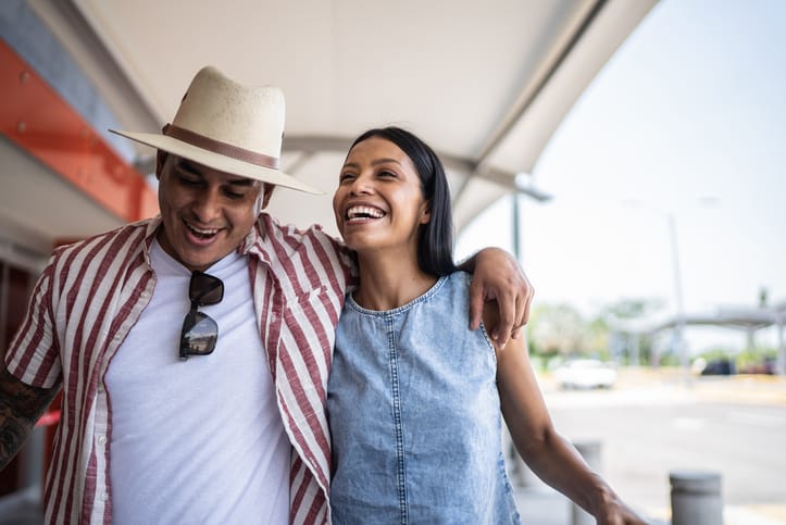 Couple at the airport after a flight.