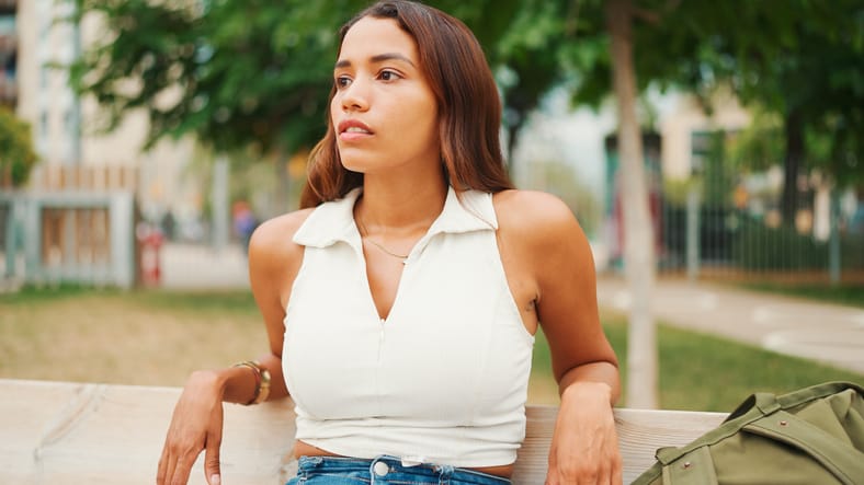 lonely woman alone on park bench