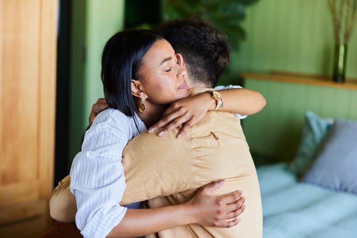 couple comforting each other with hug