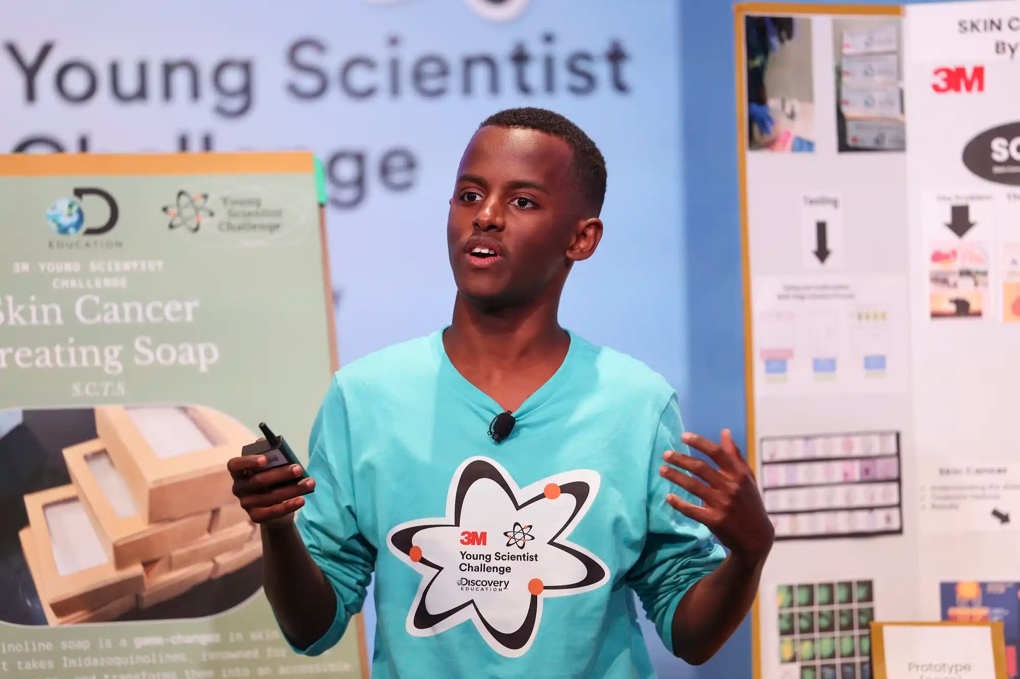 Heman Bekele giving science presentation.