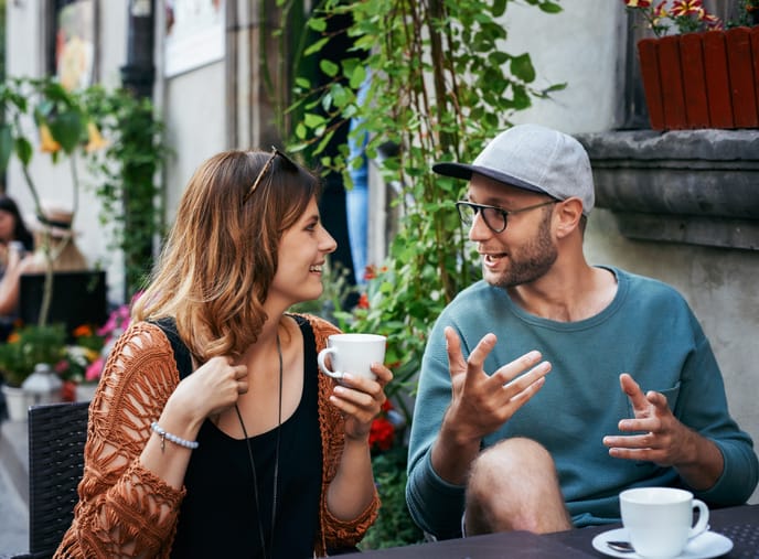 couple having coffee at outdoor cafe