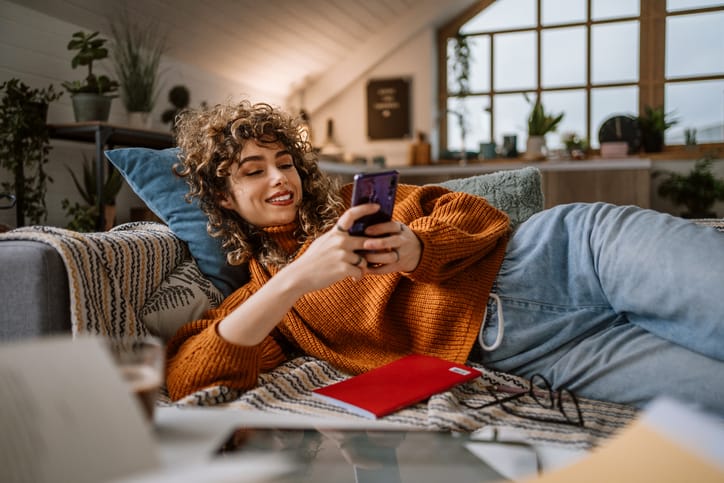 woman hanging out alone on her couch