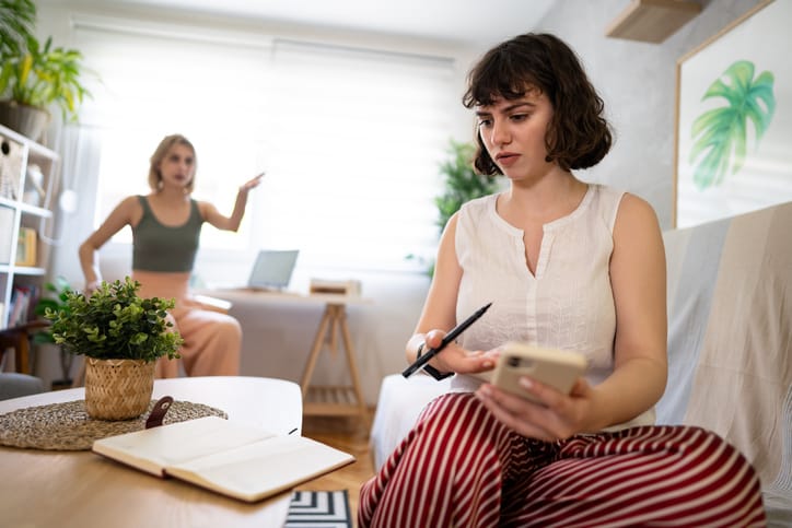 two female roommates arguing