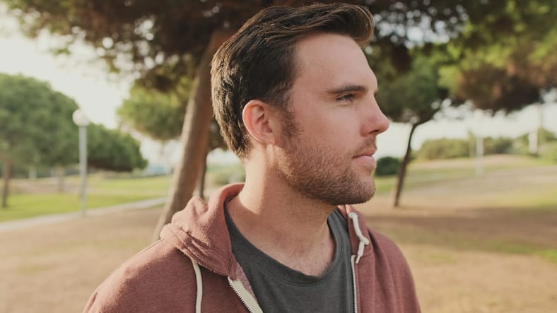 Portrait of a young man in the park