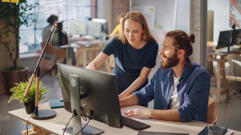 millennial colleagues collaborating at work