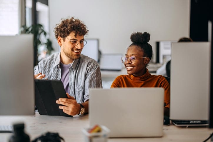 male female colleague working together
