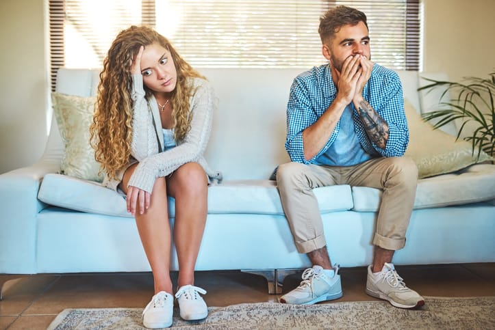 Shot of a young couple having a disagreement at home