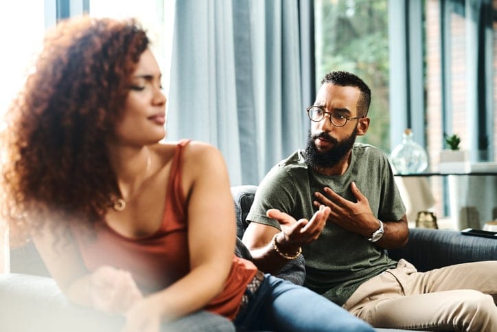 Cropped shot of a young couple having an argument at home