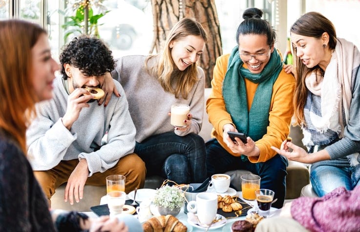 Friends chatting at a party.