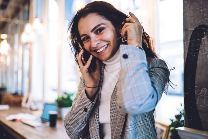 Smiling woman in her office.