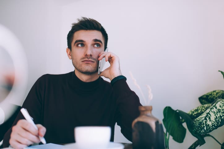 annoyed guy talking on phone