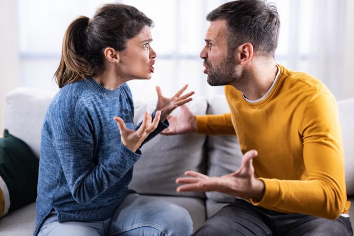 Frustrated couple having a fight.