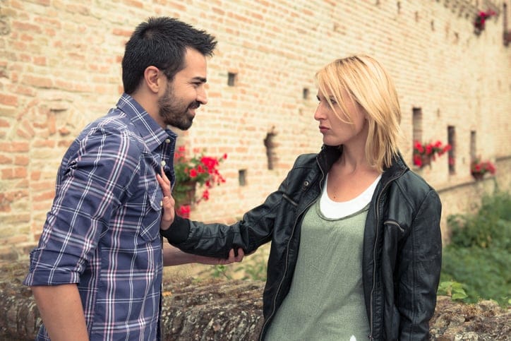 Couple have a conversation, while he's been ignored by his girlfriend