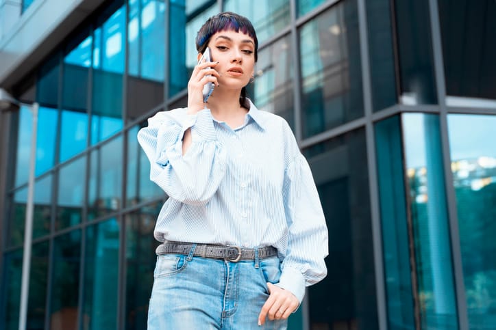 Portrait of a young woman talking on her mobile