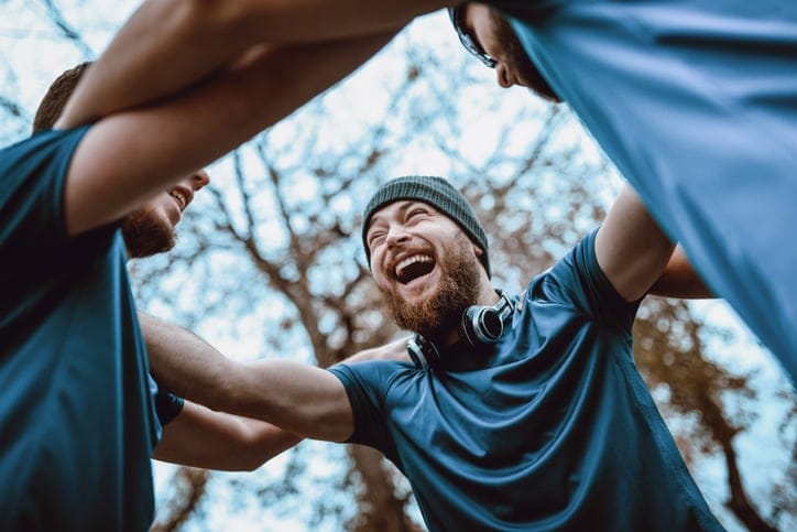 Team Celebrating After Winning a Competition.