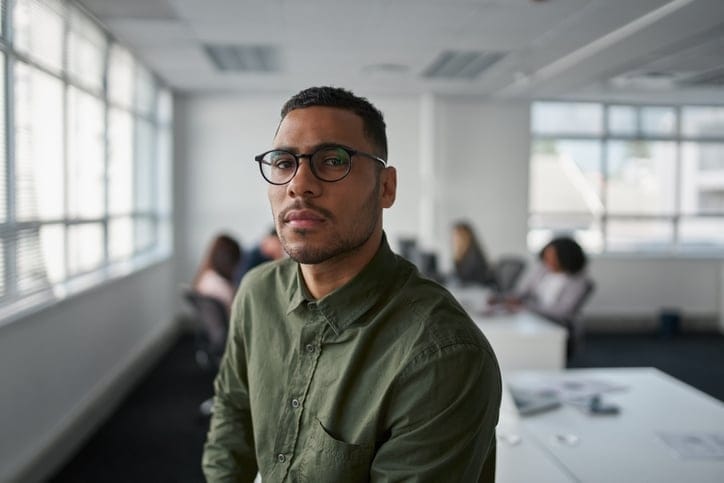 serious man sitting in office