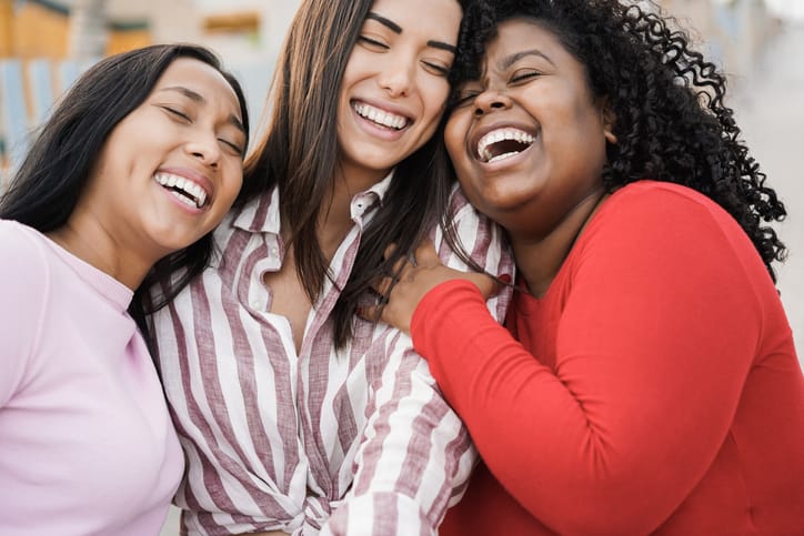 Happy women enjoy time together.