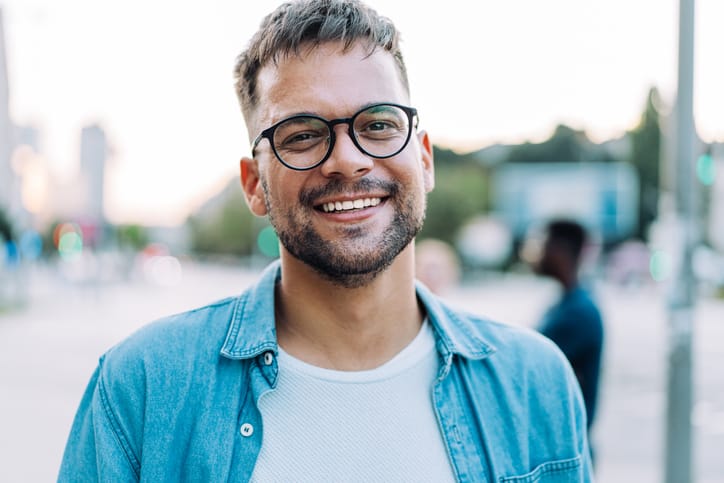 smiling handsome guy outside