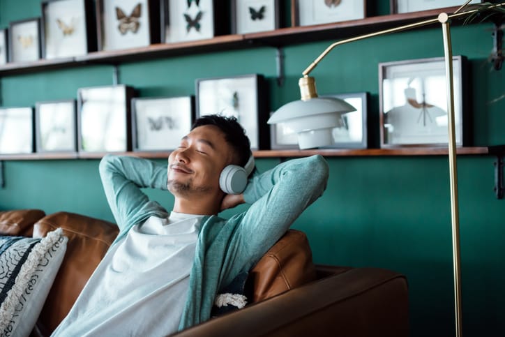 guy relaxing with headphones
