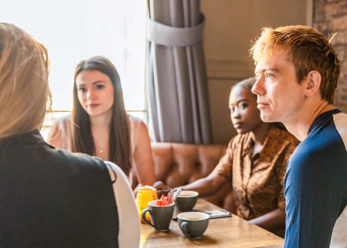 group of people having a conversation