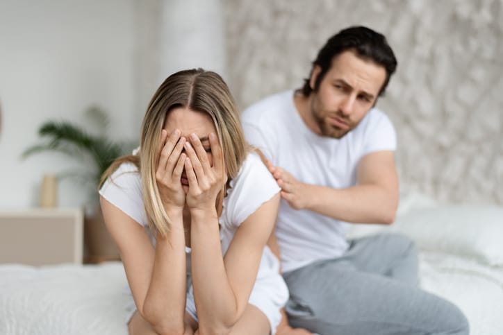 man woman unhappy couple sad argue