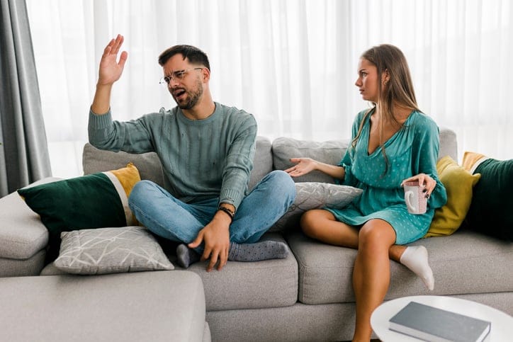Shot of a young couple having an argument at home