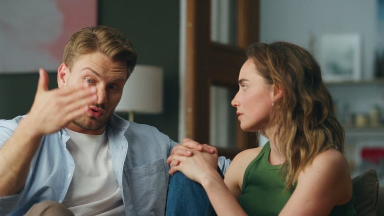 man giving woman advice