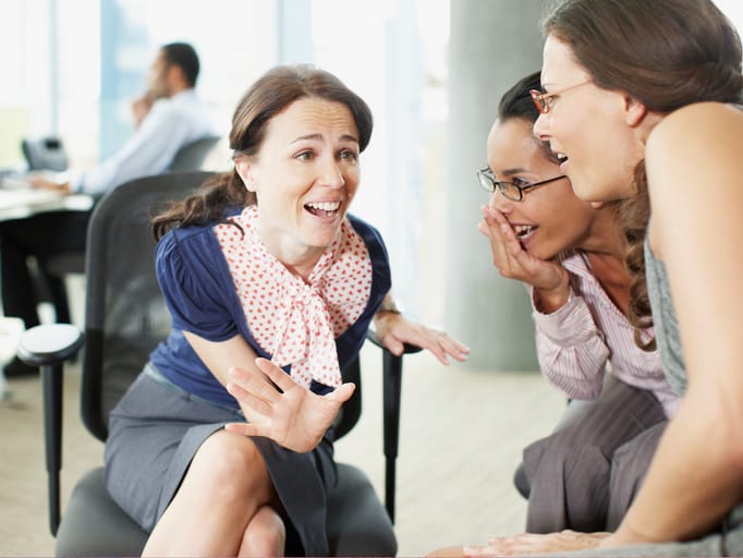 woman gossiping in an office