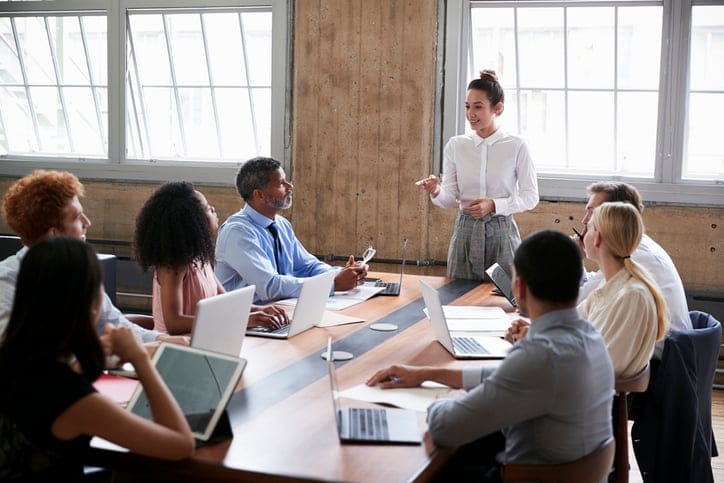 woman giving business presentation at work